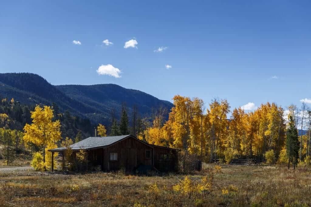 Photo of our Colorado Mountain Ranch surrounded by fall foliage