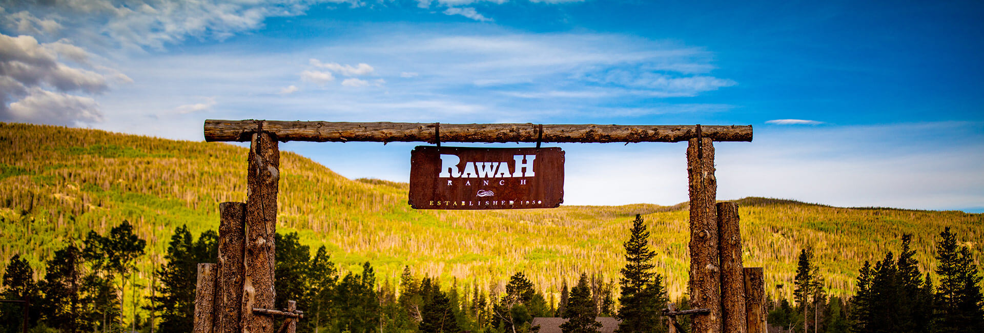 View of fall foliage in Colorado at Rawah Ranch entrance