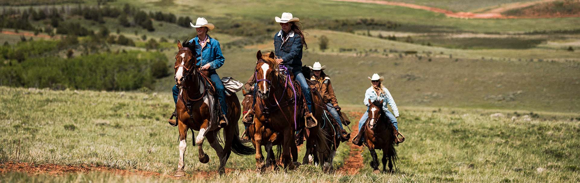 Group horseback riding at Rawah Ranch in Colorado: Group Vacation Ideas